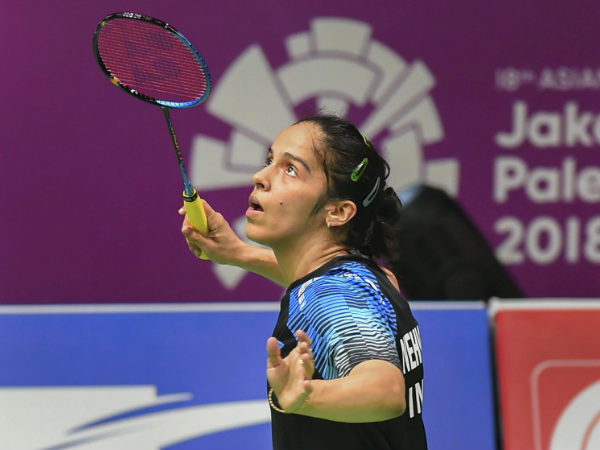 Saina Nehwal plays a shot against Irans Aghaei Hajiagha Soraya