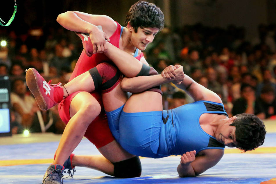 Wrestler Ritu Phogat (left) will represent India in the 53 kg category at the World Championship
