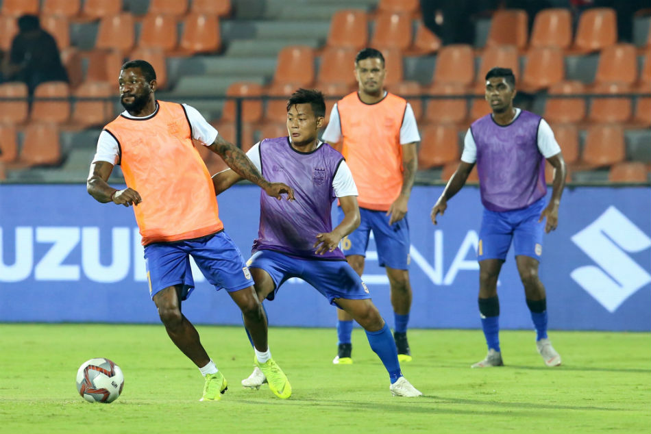 Mumbai City FC players practice before the start of the match against Jamshedpur FC in Hero ISL