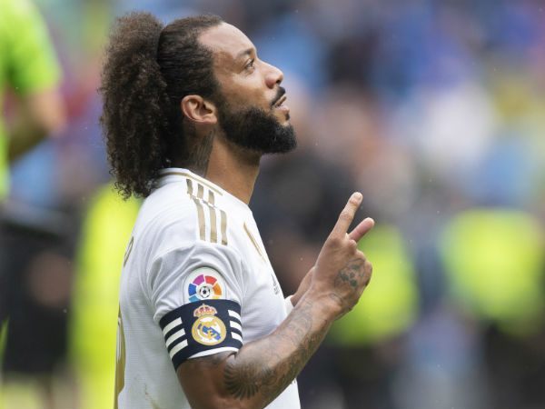 Marcelo celebrates 13 years with Real