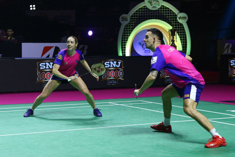 Gabrielle and Chris Adcock in action