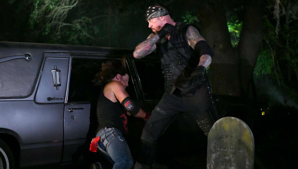 The Undertaker vs. AJ Styles in a Boneyard Match (image courtesy WWE.com) The Undertaker vs. AJ Styles in a Boneyard Match (image courtesy WWE.com)