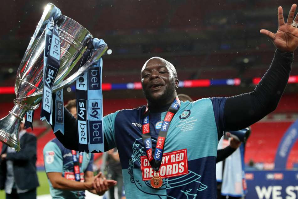 Adebayo Akinfenwa said he was only open to talking to Jurgen Klopp after Wycombe secured Championship promotion Adebayo Akinfenwa said he was only open to talking to Jurgen Klopp after Wycombe secured Championship promotion