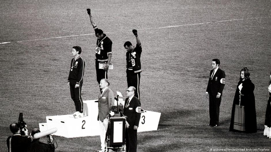 Tommie Smith (center) and John Carlos protested at the Mexico Summer Games in 1968