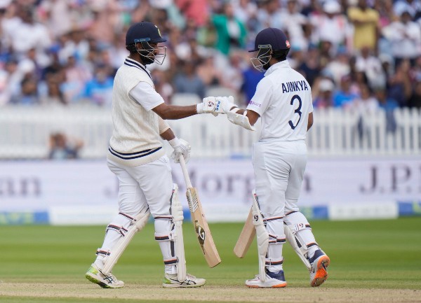 On Cheteshwar Pujara-Ajinkya Rahane stand of 100 in nearly 50 overs? Do you think their scoring rate was affected since they are under a bit of pressure?