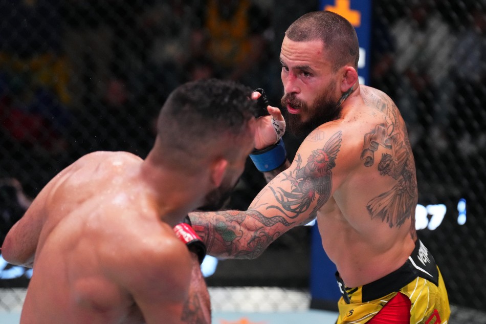 (R-L) Marlon Vera punches Rob Font in a bantamweight fight during UFC Vegas 53 on April 30, 2022 in Las Vegas, Nevada. (Photo by Chris Unger/Zuffa LLC) (R-L) Marlon Vera punches Rob Font in a bantamweight fight during UFC Vegas 53 on April 30, 2022 in Las Vegas, Nevada. (Photo by Chris Unger/Zuffa LLC)