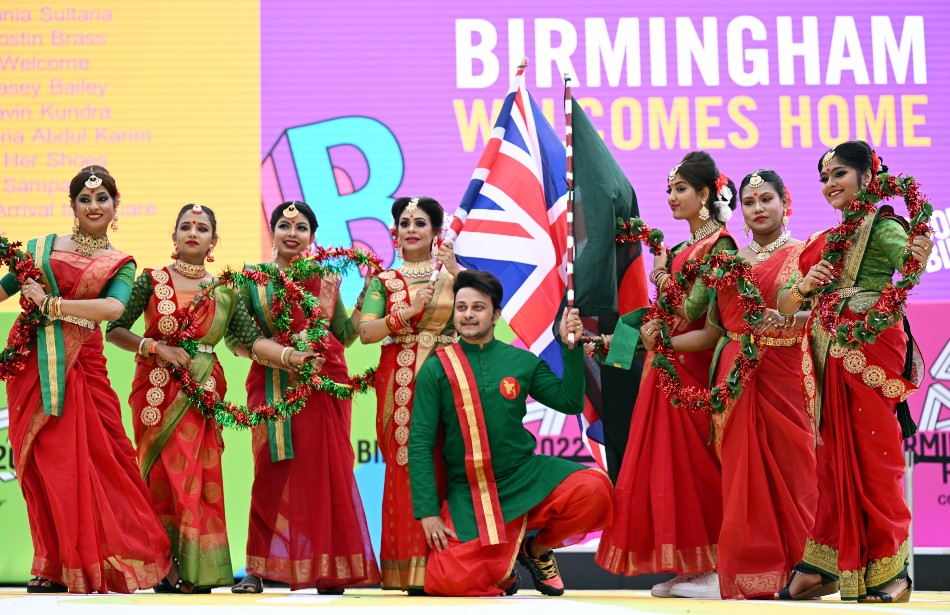 Artists pose for pictures ahead of the Opening Ceremony of the Commonwealth Games 2022