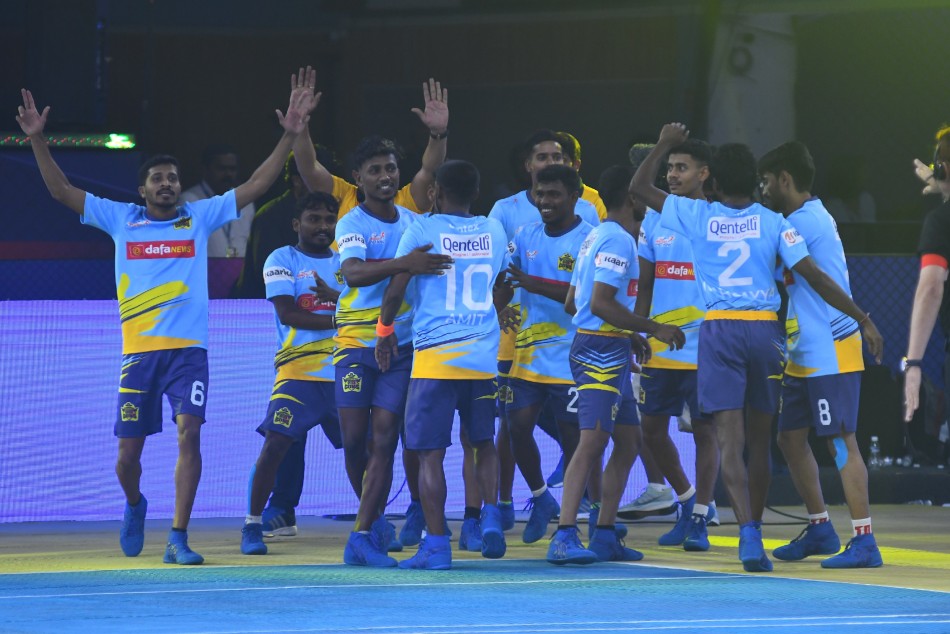 Chennai Quick Guns players celebrate after winning their first match of season