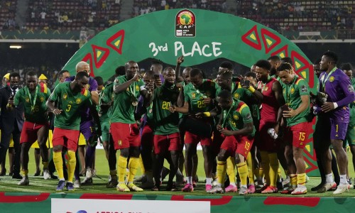Cameroon players celebrating their AFCON 3rd placed finish 