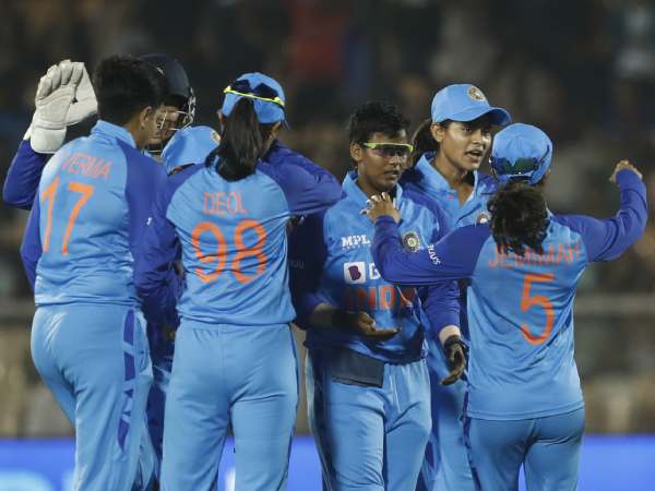 indian womens cricket team players celebrate fall of a wicket