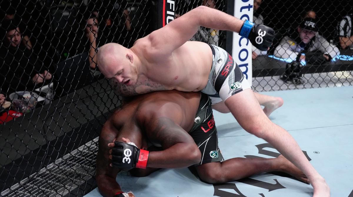 (R-L) Serghei Spivac punches Derrick Lewis in a heavyweight fight during UFC Vegas 68 on in Las Vegas, Nevada. (Photos by Jeff Bottari/Zuffa LLC via Getty Images) (R-L) Serghei Spivac punches Derrick Lewis in a heavyweight fight during UFC Vegas 68 on in Las Vegas, Nevada. (Photos by Jeff Bottari/Zuffa LLC via Getty Images)