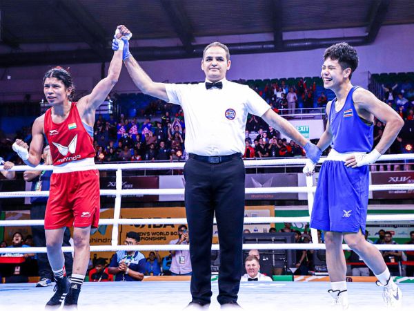 Nikhat Zareen (in red) after winning her bout 