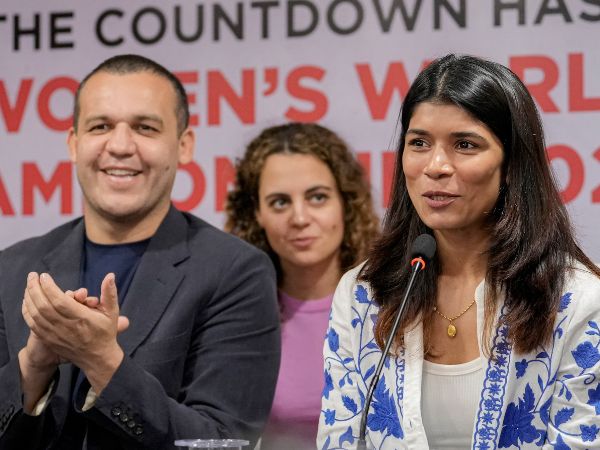 nikhat zareen with iba president umar kremlev at a press conference