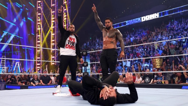 The Usos laid out Roman Reigns on Smackdown (image courtesy WWE.com)