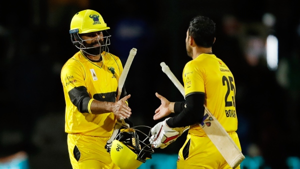 Joburg Buffaloes duo Mohammad Hafeez and Ravi Bopara after the win against Cape Town