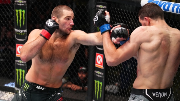 (L-R) Sean Strickland punches Abus Magomedov during UFC Vegas 76 main event. (Photo by Chris Unger/Zuffa LLC via Getty Images)