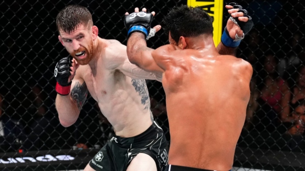 (L-R) Cory Sandhagen punches Rob Font during the UFC Nashville 2023 main event. (Photo by Jeff Bottari/Zuffa LLC via Getty Images)
