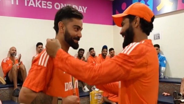 Virat Kohli receives medal from Ravindra Jadeja