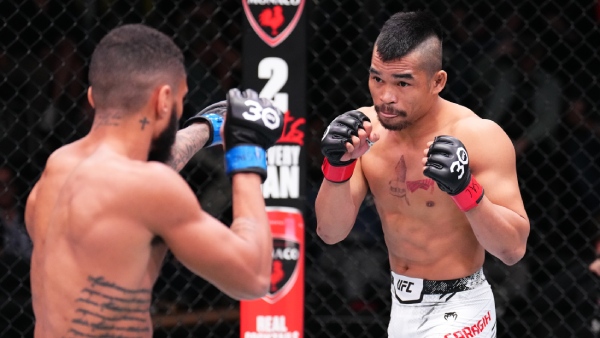 (R-L) Jeka Saragih battles Lucas Alexander on the preliminary card of UFC Vegas 82. (Photo by Chris Unger/Zuffa LLC via Getty Images)