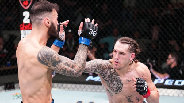 (R-L) Brendan Allen punches Paul Craig during the UFC Vegas 82 main event. (Photo by Chris Unger/Zuffa LLC via Getty Images)