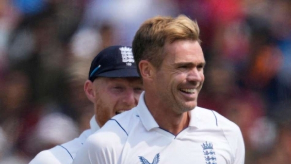 James Anderson, right, made an important breakthrough before lunch for England (Ajit Solanki/AP)