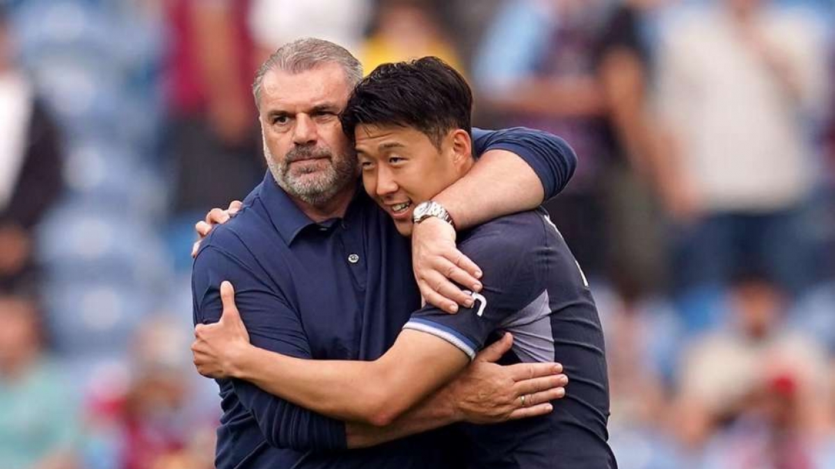 Tottenham boss Ange Postecoglou with Son Heung-min (Nick Potts/PA)