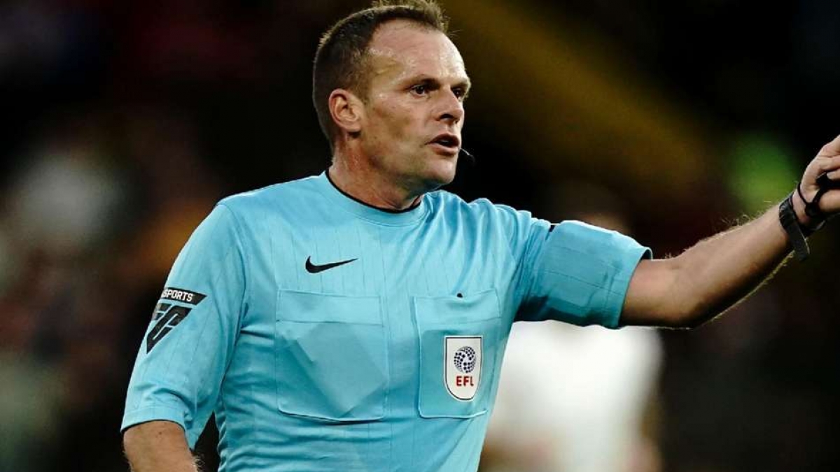 Referees, like Geoff Eltringham, pictured, could soon be showing blue cards