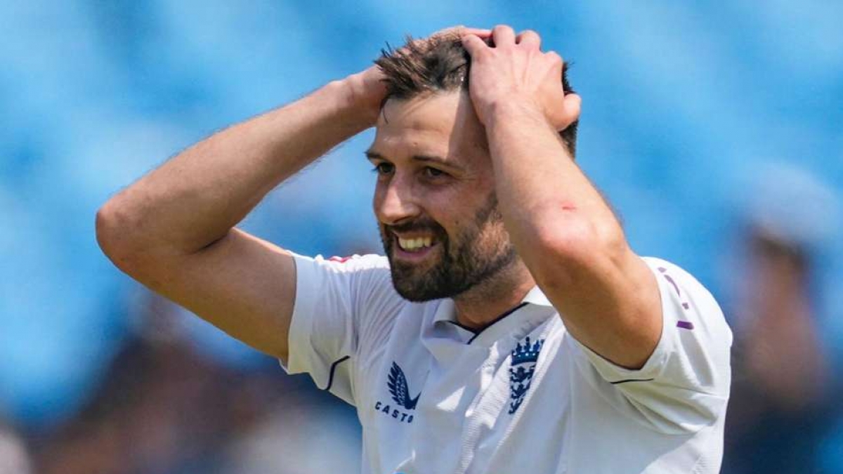 Mark Wood reacts after seeing Ben Stokes drop Ravichandran Ashwin (AP Photo/Ajit Solanki)