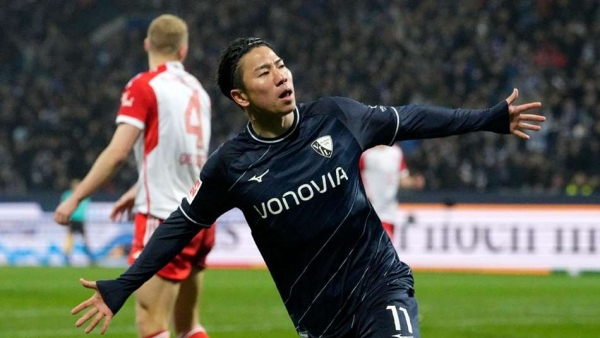 Bochum’s Takuma Asano celebrates after scoring