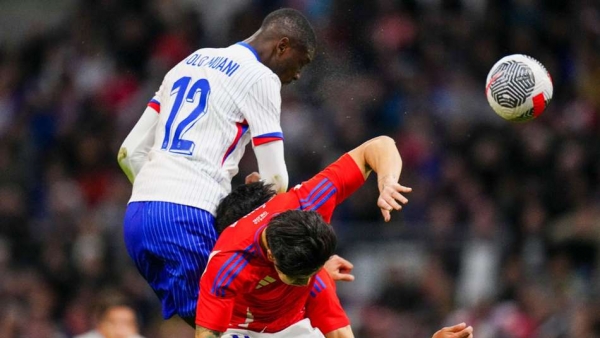 Randal Kolo Muani top headed France into a half-time lead