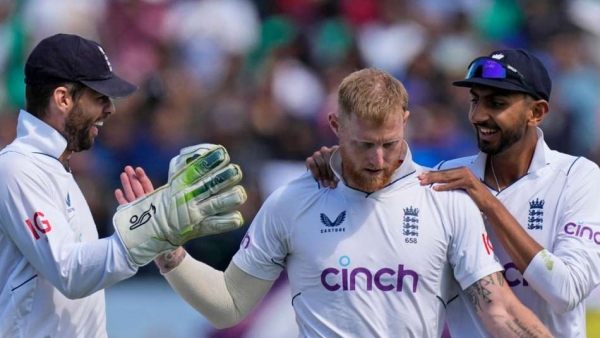 England captain Ben Stokes centre celebrates taking the wicket of Rohit Sharma Ashwini Bhatia AP