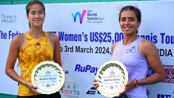 Ankita Raina right and Zhibek Kulambayeva pose with the ITF Women s Open Gurugram W25 Doubles Title