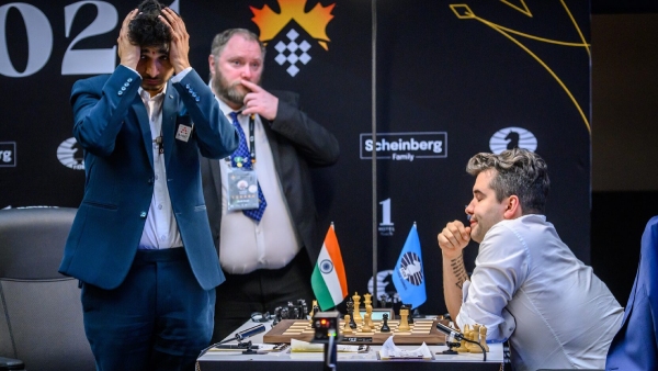 Russian GM Ian Nepomniachtchi defeated Vidit Santosh Gujarathi to climb at the top of leaderboard