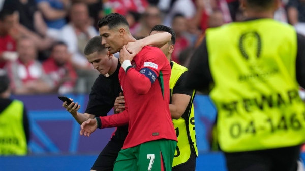 cristiano-ronaldo-just-avoided-being-hit-by-a-fan-who-jumped-from-the-crowd-to-get-to-him-at-euros