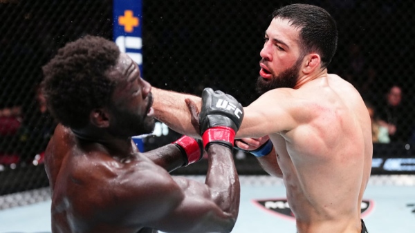 R-L Nassourdine Imavov punches Jared Cannonier during UFC Louisville 2024 main event Photo by Jeff Bottari Zuffa LLC via Getty Images