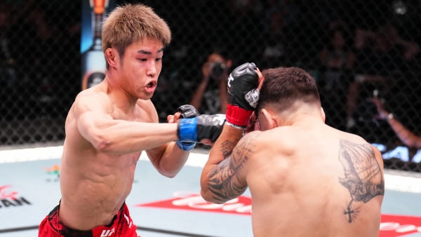 L-R Tatsuro Taira punches Alex Perez during the UFC Vegas 93 main event Photo by Chris Unger Zuffa LLC via Getty Images