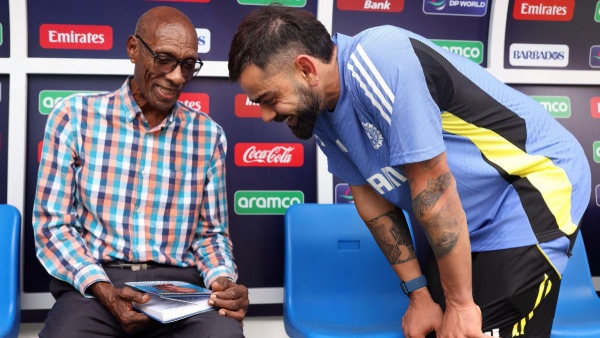 Wesley Hall and Virat Kohli