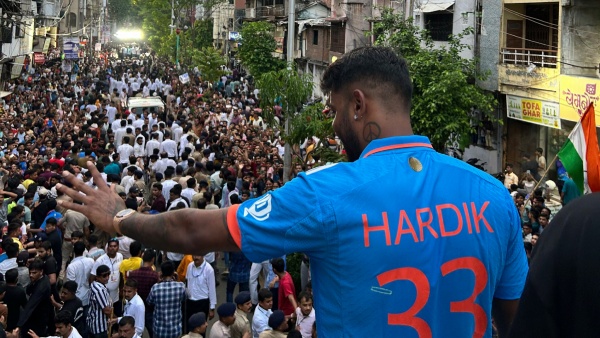 Hardik Pandya waves at fans during the road show in Vadodra Image Twitter