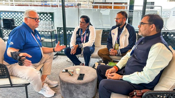 UWW president meets IOA and WFI officials
