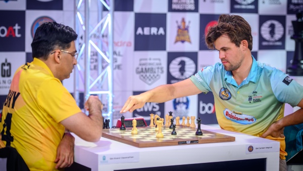 Viswanathan Anand and Magnus Carlsen in action during the opening day of Global Chess League 2024