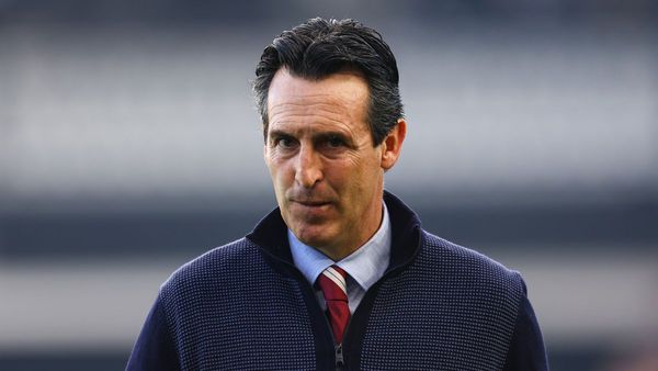 Emery Focused on Silverware with Villa