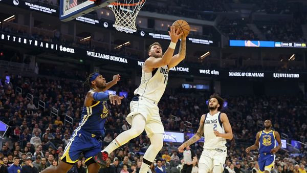 Doncic's Triple-Double Fuels Mavs Victory Over Warriors
