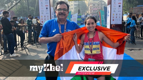 Nirmaben Thakor right with her coach after winning Tata Mumbai Marathon on January 19