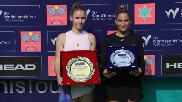 Tatiana Prozorova left and Panna Udvardy pose with the trophy after ITF W50 final in New Delhi Image Courtesy Media Release