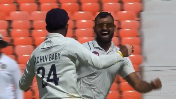 Aditya Sarwate celebrates with Sachin Baby as Kerala created history by beating Gujarat to reach their maiden Ranji Trophy final