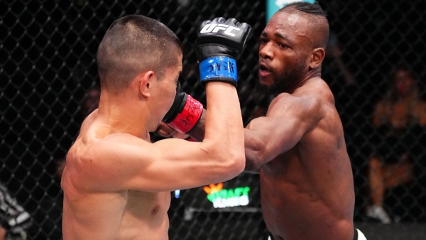 R-L Manel Kape punches Asu Almabayev during flyweight headliner of UFC Vegas 103 Photo by Jeff Bottari Zuffa LLC