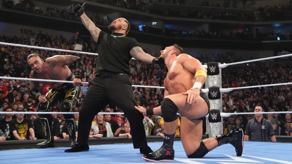 Solo Sikao attacks LA Knight during SmackDown is Des Moines Iowa Image Courtesy WWE com
