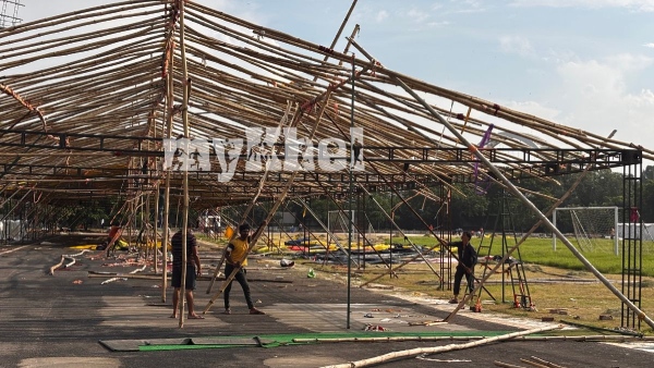 Tents and sheds getting set up before installing mondotrack