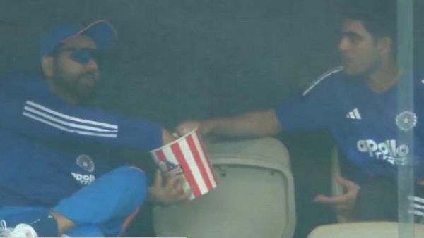 IND vs AUS Rohit Sharma Shubman Gill end Rift Rumours seen Chatting with Popcorn in Rain Marred Perth