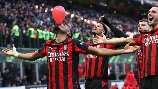 Nkunku brace sends Milan top